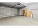 Spacious three car garage with epoxy flooring at 3334 Cloninger Rd, Dallas, NC 28034