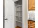 A well-organized pantry with adjustable shelving provides ample storage space for kitchen essentials at 3334 Cloninger Rd, Dallas, NC 28034