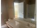 Bathroom with a vanity, sink, toilet, and combined shower and tub at 5650 Kimmerly Woods Dr, Charlotte, NC 28215