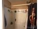 Standard shower featuring functional design with shower curtain at 5650 Kimmerly Woods Dr, Charlotte, NC 28215