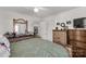 Spacious bedroom featuring hardwood floors and natural light creating a serene atmosphere at 727 Fickling Dr, Lancaster, SC 29720