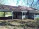 Exterior view of a house with an attached carport, providing sheltered parking and additional storage space at 922 Marshville Olive Branch Rd, Marshville, NC 28103