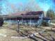 Front exterior of a ranch-style house with a full porch and a spacious front yard at 922 Marshville Olive Branch Rd, Marshville, NC 28103