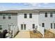 Backyard featuring vinyl siding and a concrete patio at 10036 Brittondale Ln, Charlotte, NC 28215