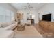 Bright and airy living room featuring hardwood floors, and an open floor plan at 10421 Superb Ln, Charlotte, NC 28215