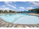 Resort style community pool with a splash pad and ample lounge chairs at 10421 Superb Ln, Charlotte, NC 28215