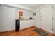 Finished basement with a wine cooler and cabinets for bar at 107 Wedgewood Ne Cir, Concord, NC 28025
