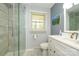 This bathroom features a walk-in shower, toilet, and single sink vanity at 107 Wedgewood Ne Cir, Concord, NC 28025