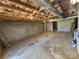 Unfinished basement with exposed ceiling, concrete walls, and ample potential for customization at 1301 Huckleberry Dr, Lincolnton, NC 28092