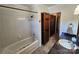 Bathroom with shower and bathtub combination, updated vanity, and tile flooring at 1301 Huckleberry Dr, Lincolnton, NC 28092