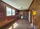 Versatile bonus room featuring brick accents, ample lighting, and built-in shelving at 1301 Huckleberry Dr, Lincolnton, NC 28092