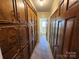 Hallway with ample closet storage space and views to the bathroom at 1301 Huckleberry Dr, Lincolnton, NC 28092