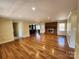 Spacious living room with hardwood floors and fireplace, perfect for entertaining Gathering and friends at 1301 Huckleberry Dr, Lincolnton, NC 28092