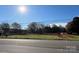 Cleared land with a large grassy area and some trees at 1554 Landis Hwy, Mooresville, NC 28115