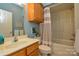 Bathroom features coordinated fixtures, a shower-tub combination, and wooden vanity at 161 Seven Springs Loop # 11, Statesville, NC 28625
