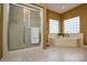 Spacious bathroom with a glass-enclosed shower and separate bathtub at 161 Seven Springs Loop # 11, Statesville, NC 28625