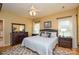 Bright bedroom with hardwood floors, a ceiling fan, and coordinated furnishings at 161 Seven Springs Loop # 11, Statesville, NC 28625