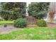Charming entrance to Seven Springs neighborhood with brick signage and lush landscaping at 161 Seven Springs Loop # 11, Statesville, NC 28625