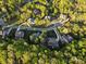 A high angle showcasing well-maintained lawns and a peaceful, wooded neighborhood setting at 1614 Shimron Ln, Waxhaw, NC 28173