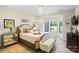 Charming bedroom with a chandelier, a bay window, and decorative accents at 1614 Shimron Ln, Waxhaw, NC 28173