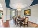 Traditional dining room with chandelier lighting and beautiful picture window at 1614 Shimron Ln, Waxhaw, NC 28173