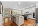 Spacious kitchen featuring an island with seating at 1614 Shimron Ln, Waxhaw, NC 28173