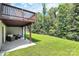 Spacious backyard with a deck and patio, perfect for outdoor entertaining and relaxation with privacy at 1809 Mill Creek Sw Ln, Concord, NC 28025