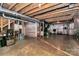 Unfinished basement with exposed beams and ample storage, perfect for customization at 1809 Mill Creek Sw Ln, Concord, NC 28025