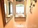 Luxurious bathroom featuring a standalone tub, elegant columns, and marble flooring, designed for relaxation and comfort at 1832 Marthas Vineyard Rd, York, SC 29745