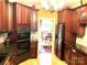 Well-equipped kitchen featuring wood cabinets, granite countertops, modern appliances, with a dining area in the background at 1832 Marthas Vineyard Rd, York, SC 29745