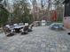 Patio with outdoor seating, a built-in grill, and a landscaped backyard at 1832 Marthas Vineyard Rd, York, SC 29745