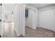 Hallway with a laundry nook and closets at 1921 Woodridge Dr, Hickory, NC 28602