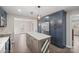 Updated kitchen features stainless steel appliances and a custom kitchen island at 1921 Woodridge Dr, Hickory, NC 28602