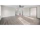 Spacious main bedroom with natural light and hardwood floors at 1921 Woodridge Dr, Hickory, NC 28602