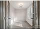 Office space with French doors, natural light, and hardwood flooring at 1921 Woodridge Dr, Hickory, NC 28602