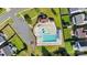 Aerial view of the community pool and amenities, with landscaping and convenient parking at 1923 Caprington Dr, Fort Mill, SC 29707