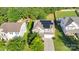 Aerial view of house with solar panels, beautiful landscaping, and neighborhood surroundings at 1923 Caprington Dr, Fort Mill, SC 29707