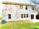 Backyard features a well-maintained lawn, patio, and classic siding at 1923 Caprington Dr, Fort Mill, SC 29707