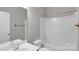 Neat bathroom featuring a shower-tub combo and a vanity with modern fixtures at 1923 Caprington Dr, Fort Mill, SC 29707