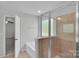 Modern bathroom featuring a glass-enclosed shower, soaking tub, and neutral finishes, creating a spa-like retreat at 1923 Caprington Dr, Fort Mill, SC 29707