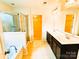 Bathroom features a soaking tub, shower, and double sink vanity at 1923 Caprington Dr, Fort Mill, SC 29707