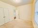 Bright bedroom with carpet, closet, and a window for natural light at 1923 Caprington Dr, Fort Mill, SC 29707