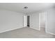Neutral bedroom featuring carpeted floors, a closet, and a door leading to another room at 1923 Caprington Dr, Fort Mill, SC 29707