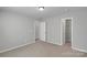 Spacious bedroom with neutral carpet and two door entryways offer great space at 1923 Caprington Dr, Fort Mill, SC 29707