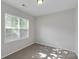 Bright bedroom with natural light, neutral walls, plush carpet and window with blinds at 1923 Caprington Dr, Fort Mill, SC 29707