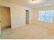 Bedroom with neutral carpet, a large window, and a view of the outside at 1923 Caprington Dr, Fort Mill, SC 29707