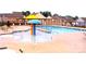 Community pool with colorful mushroom fountain features and plenty of seating at 1923 Caprington Dr, Fort Mill, SC 29707