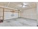Spacious unfinished garage with concrete flooring and attached garage door opener at 1923 Caprington Dr, Fort Mill, SC 29707
