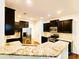 Well-lit kitchen featuring stainless steel appliances and granite countertops at 1923 Caprington Dr, Fort Mill, SC 29707