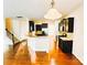 Open-concept kitchen features dark cabinets, granite countertops, and stainless steel appliances at 1923 Caprington Dr, Fort Mill, SC 29707